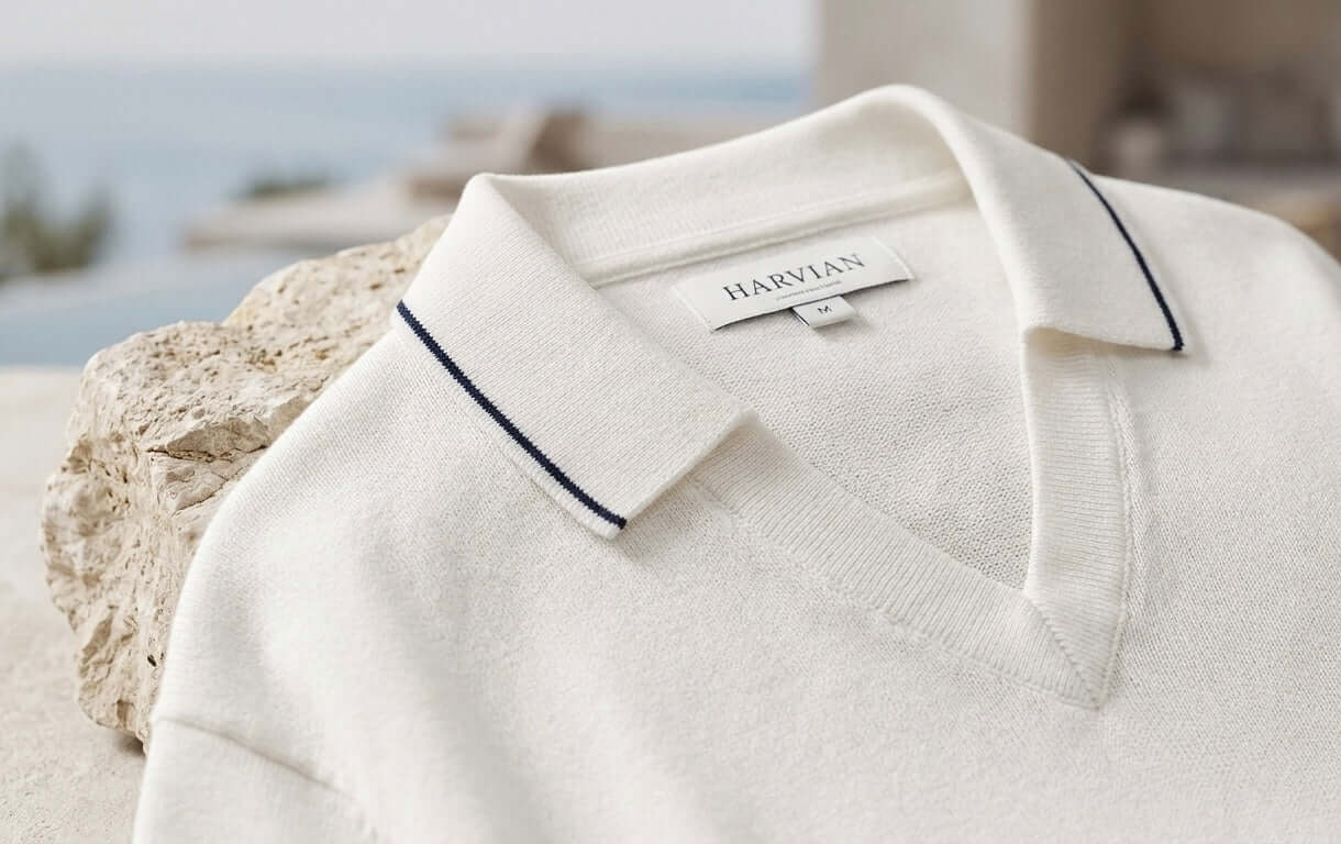 HARVIAN Amalfi V-Neck premium V-neck T-shirt with a stylish collar detail on a stone surface.